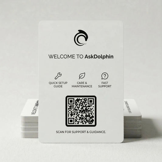 Stack of AskDolphin packaging insert cards designed for post-purchase onboarding and support guidance