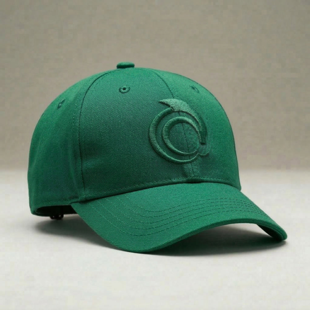 Green cap with the AskDolphin logo on a beige background